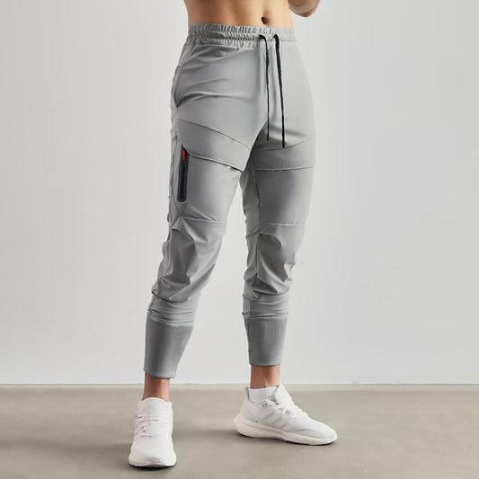 Pantalon de jogger élastique entièrement conditionnel pour hommes avec conception de fermeture éclair